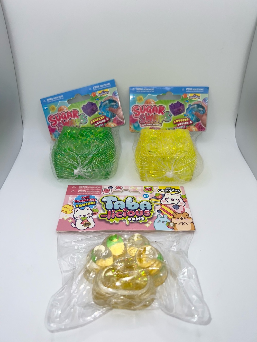 Tabalicious and sugar swaps viral squishy bundle of 3, glitter squish blocks paw